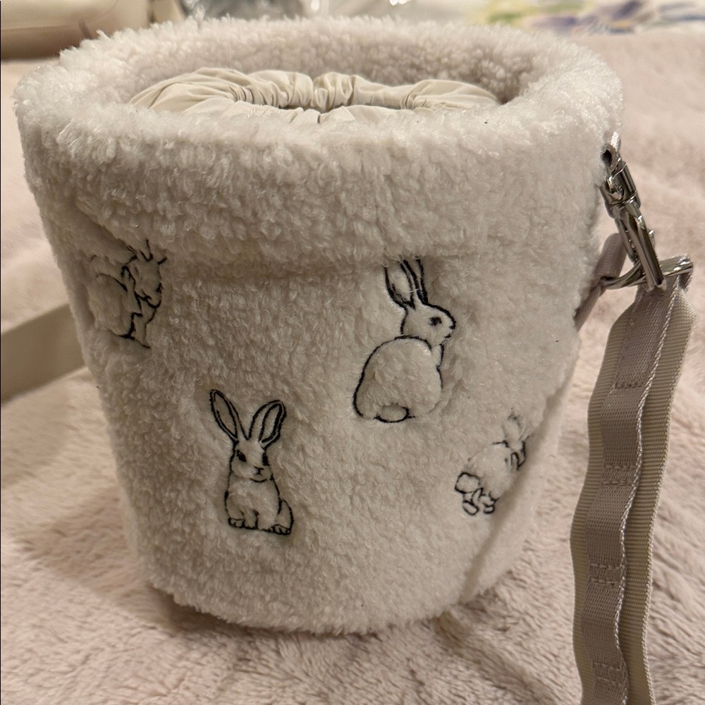 Lululemon Plush Bunny Crossbody Bucket Bag in Cream